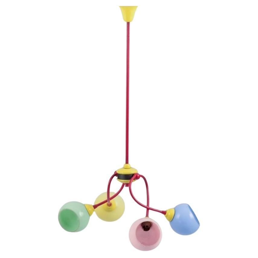 Murano, Italy. "Tutti Frutti" chandelier in colored metal, with glass shades.