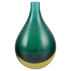 Murano, Italy. Vase in green art glass with bulbous shape. Approx. 1960
