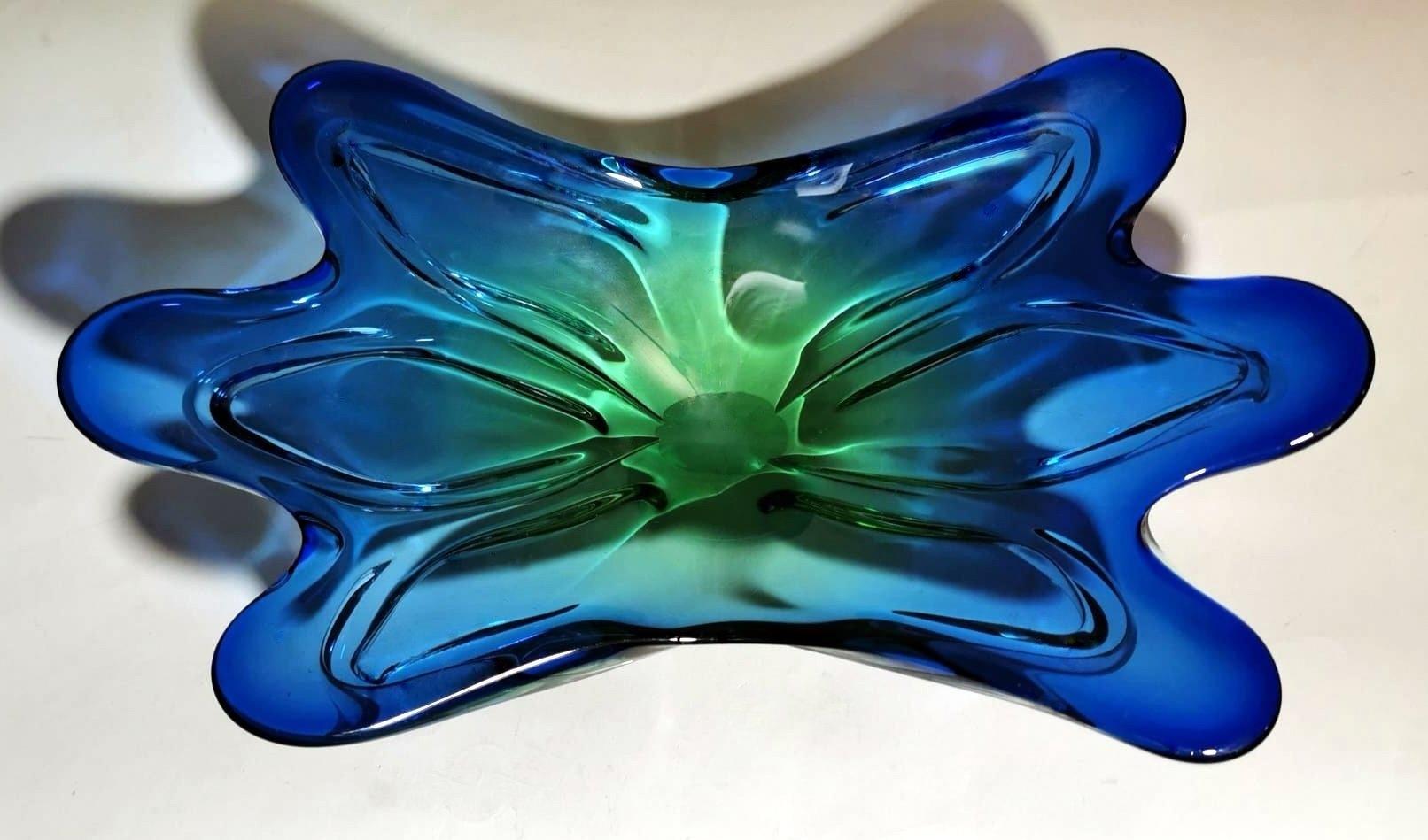 We kindly suggest you read the whole description, because with it we try to give you detailed technical and historical information to guarantee the authenticity of our objects.
Exceptional and attractive colored Murano glass table centerpiece; the