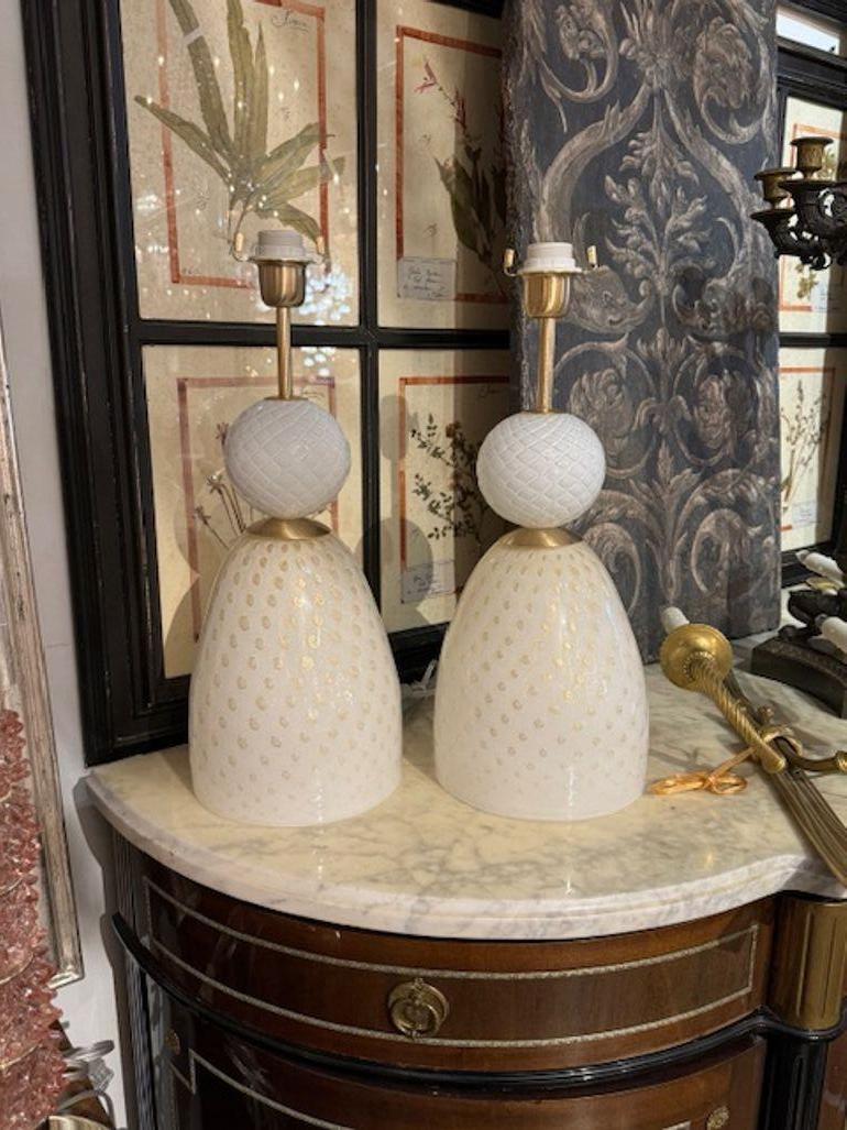 Pair of modern Murano ivory and gold glass lamps. Circa 2000. Perfect for today's transitional designs! 20'H x 8