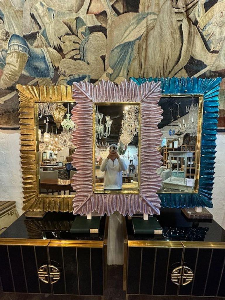 Gorgeous modern soft lavender glass and brass mirror. Sure to make a statement!