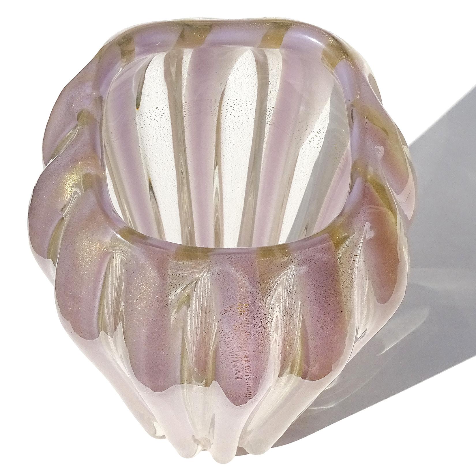 Beautiful and large, vintage Murano hand blown lavender purple and gold flecks Italian art glass flower vase. Created in the manner of designer Alfredo Barbini for the Salviati company, circa 1950s. The vase has a ribbed body, with lavender stripes