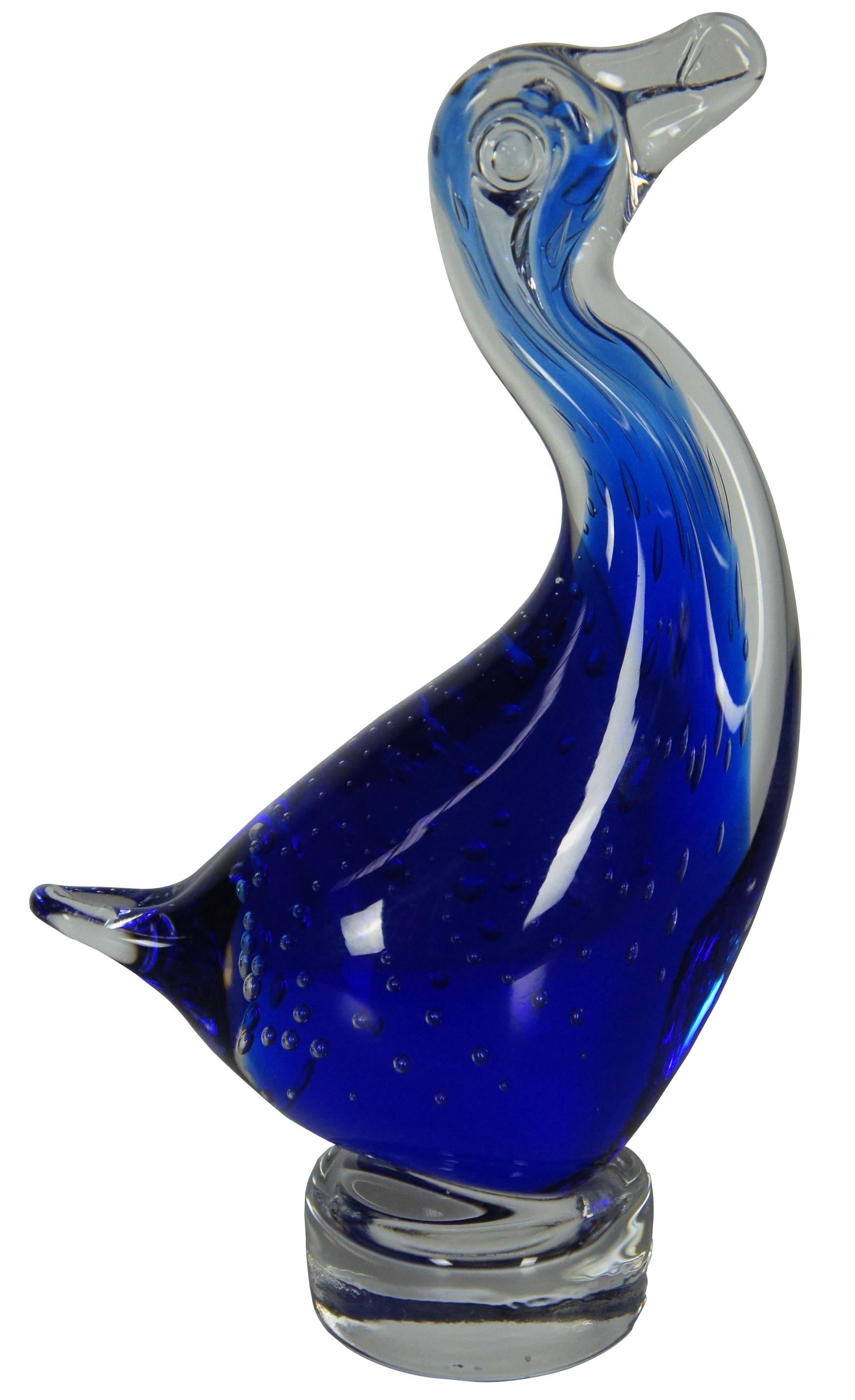 Murano studio art glass figurine in the shape of a blue duck on a transparent base with controlled bubble design, by Lavorazione Arte, Italy. Measure: 8