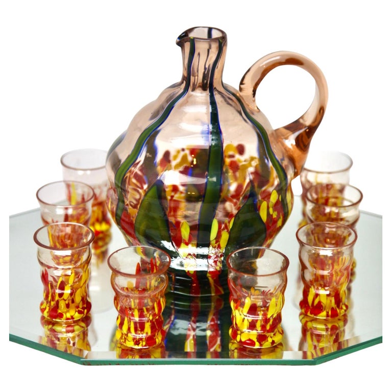 https://a.1stdibscdn.com/murano-liqueur-set-8-shot-glasses-and-decanter-with-serving-tray-circa-1938-for-sale/f_14412/f_309838621666593172077/f_30983862_1666593172722_bg_processed.jpg?width=768