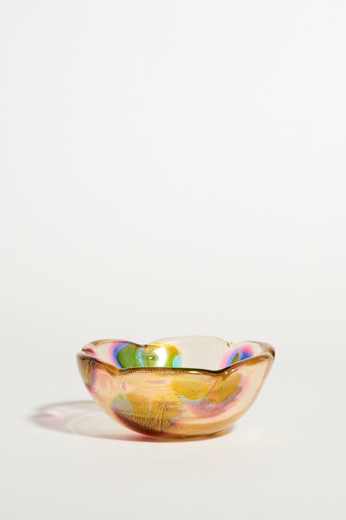 Beautiful Murano macchie bowl with petal shaped rim, abstract molten patterns in pink, violet, lilac, blue, amber and green overlaid with shimmering gold dust. Part of a collection stored in drawers, pristine condition.