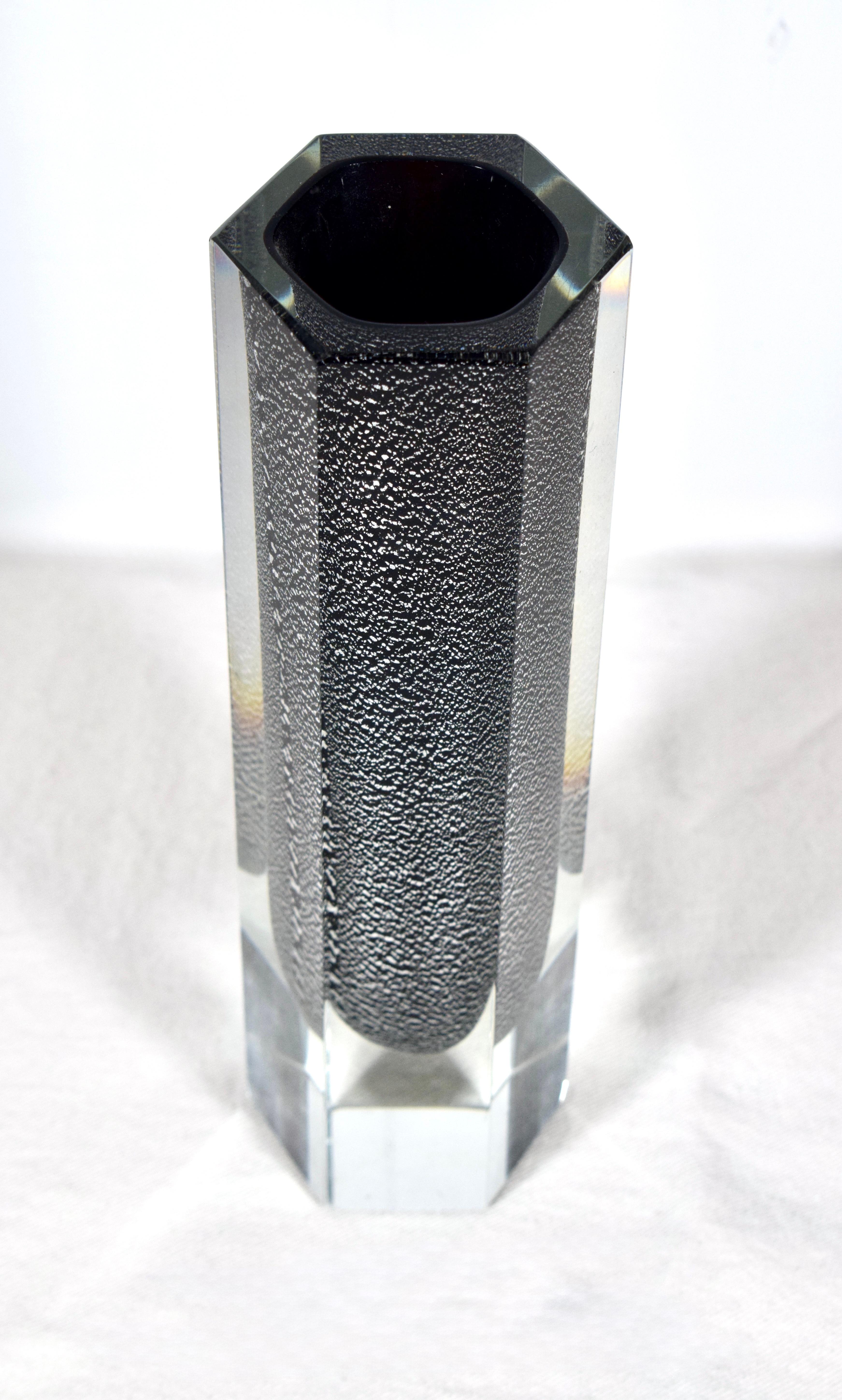A striking Murano glass Silver leaf and black Sommerso vase, made in Italy by Alessandro Mandruzzato, circa 1970’s.  Murano Mandruzzato hexagonal glass vases are noteworthy for their geometric, hexagonal shapes. Created by the Mandruzzato family in