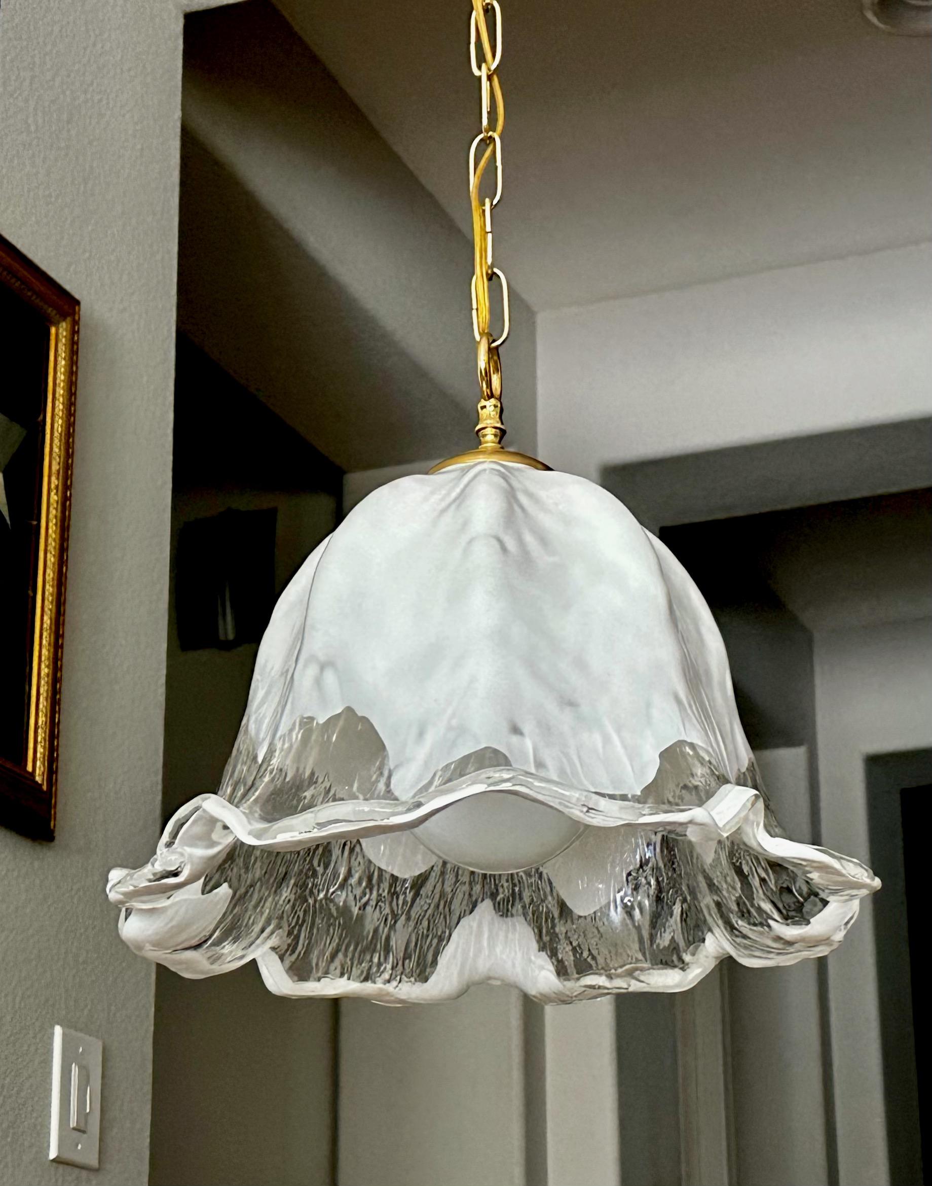 Italian Mazzega tulip shape pendant ceiling light with textured clear and white glass. Murano fixture uses regular A base bulb. Newly wired with new chain and ceiling cap. Perfect for hall, entry or breakfast eating area. 
Fixture size 12