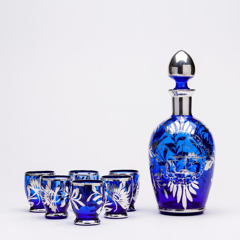 https://a.1stdibscdn.com/murano-mid-century-silver-overlay-blue-glass-liqueur-decanter-and-glasses-for-sale-picture-12/f_13282/f_271634221643744334774/I01_master.jpg?width=768