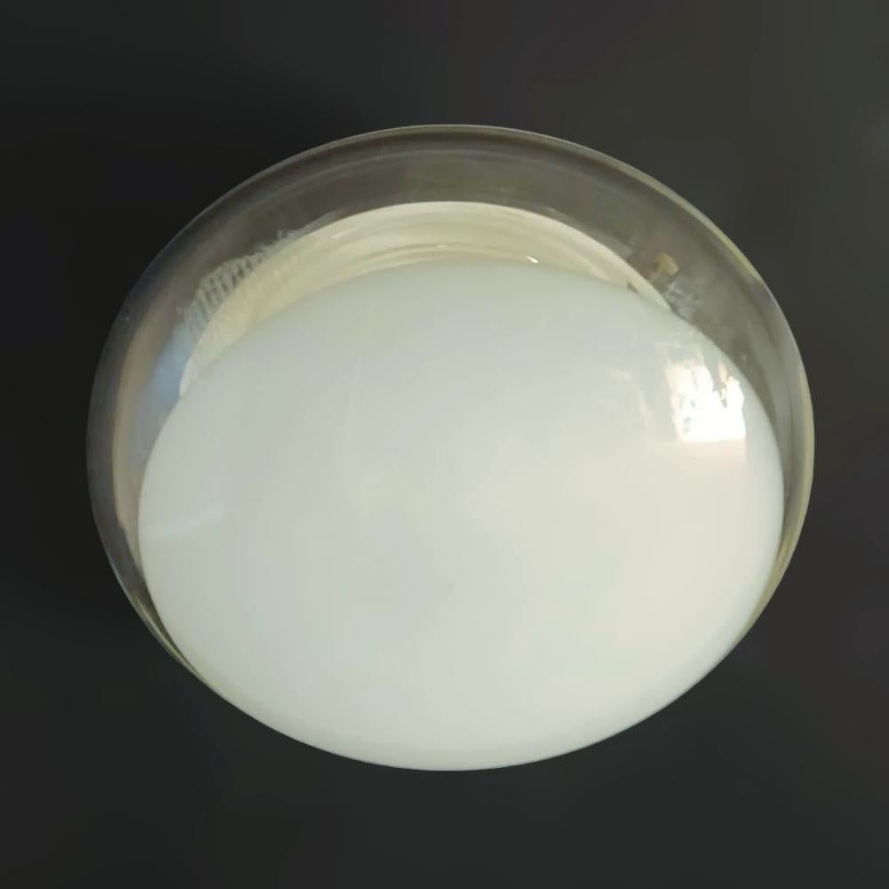 Vintage Italian flush mount with milky white and clear Murano glass shade / Made in Italy by Vistosi, circa 1960s
Measures: diameter 10.5 inches, height 5 inches
2 lights / E12 or E14 type / max 40W each
3 available in stock in Italy, price listed