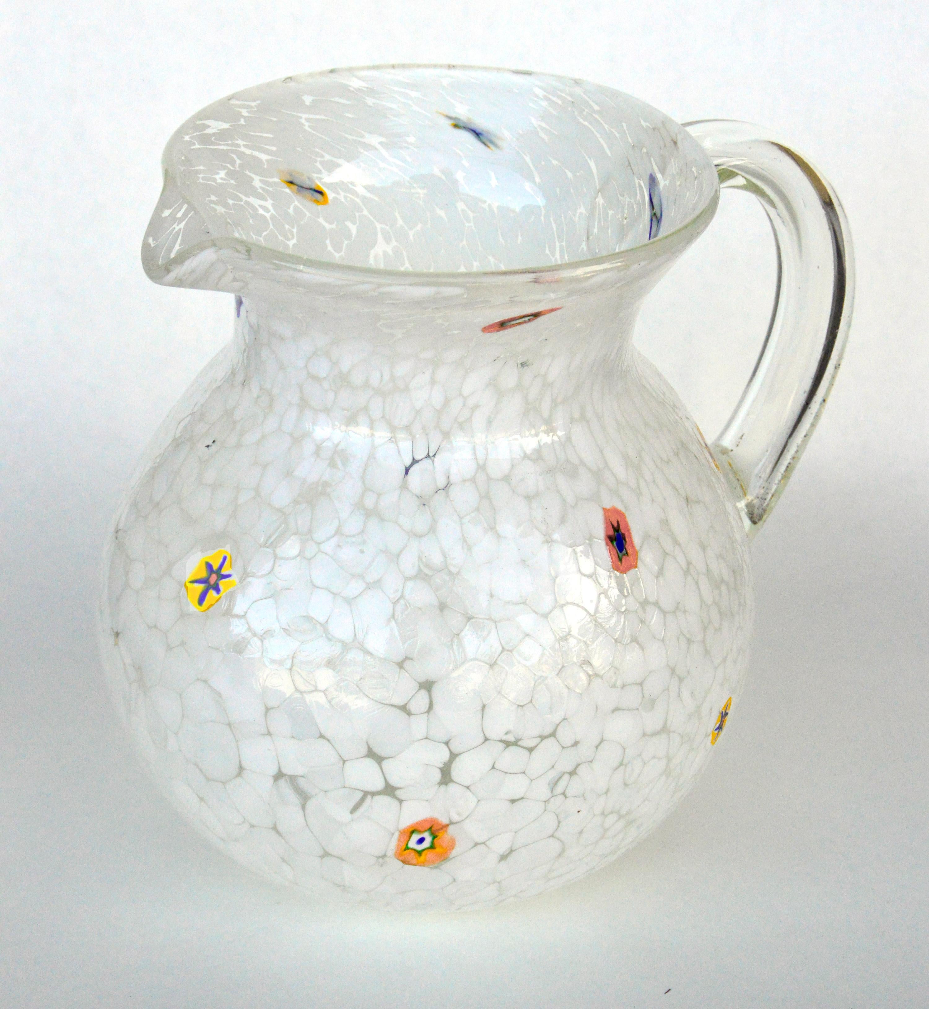 Whimsical Murano art glass water pitcher, beautiful white with multicolor Millefiori design. Measures: 8