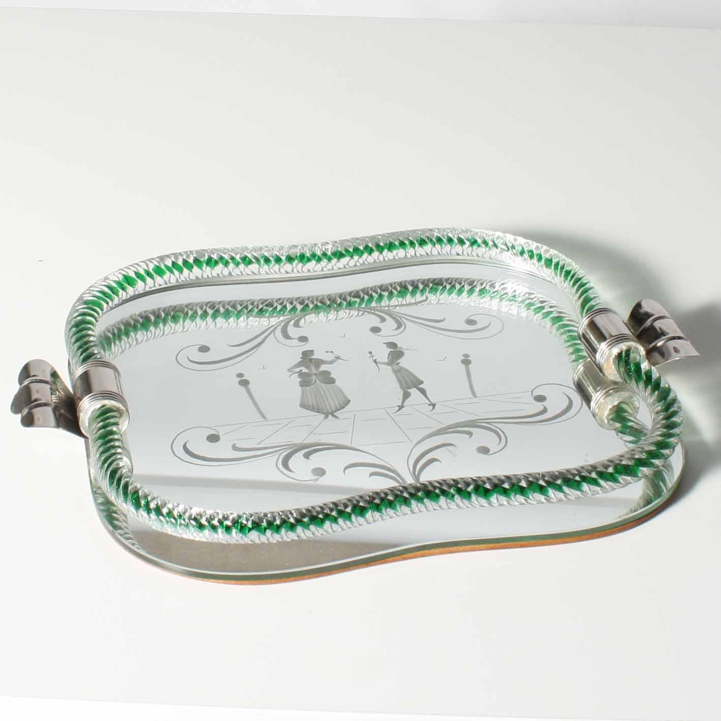 Murano mirrored tray with green blown Murano glass edging and sterling silver handles. Etched dancing scene in clear mirror.