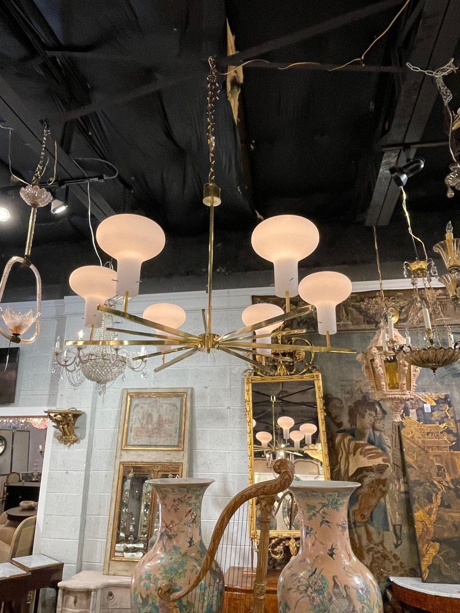 Modern Italian brass and glass 6-light chandelier. Circa 2000. Perfect for today's transitional designs!