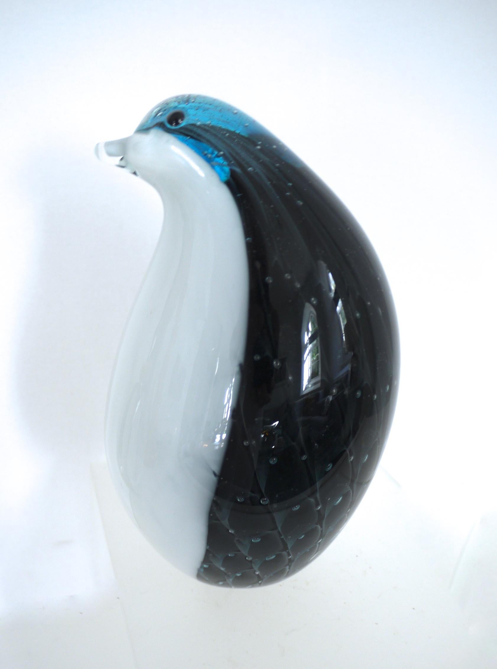 Murano modernist penguin figurine Archimede Seguso Art Vitra 1975-1979 Sommerso
Archimede Seguso was an Italian glass manufacturer known for his intricate glass vases, necklaces, and sculptures. Spanning a wide range of forms and colors, his