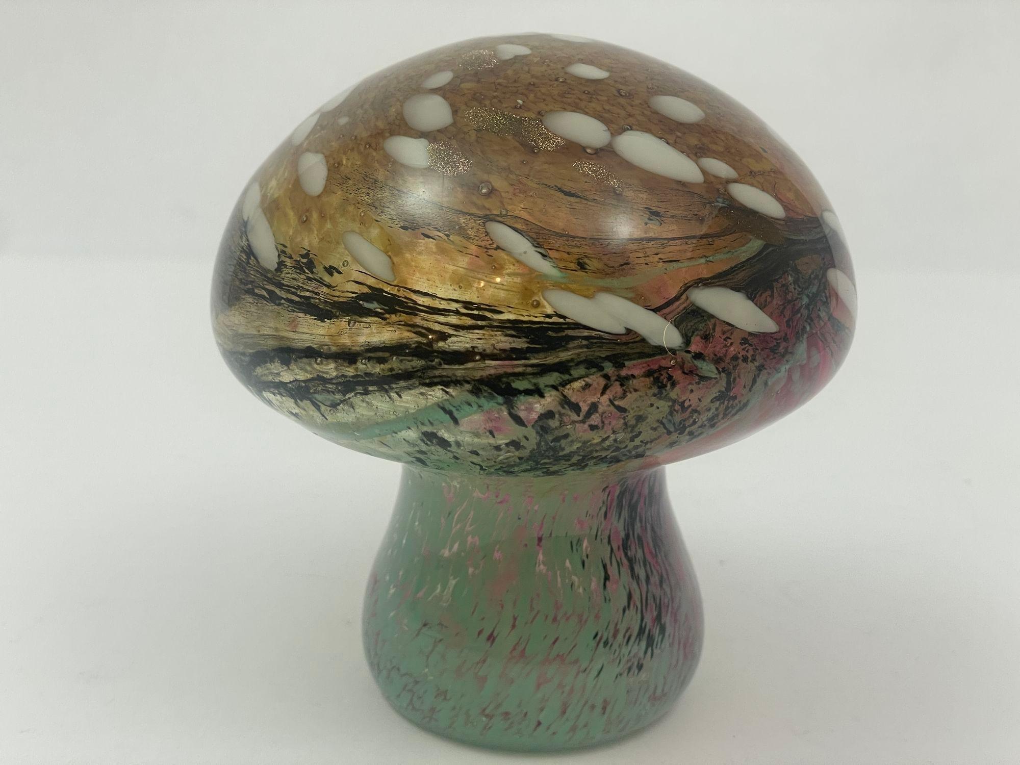Murano Style Italian Art Glass Mushroom Toadstool Paperweight Pink, Gold Murine, Green and White 1980s.
Beautiful vintage Murano style hand made pink with gold, green and white spots Italian art glass mushroom toadstool paperweight.
It is made with