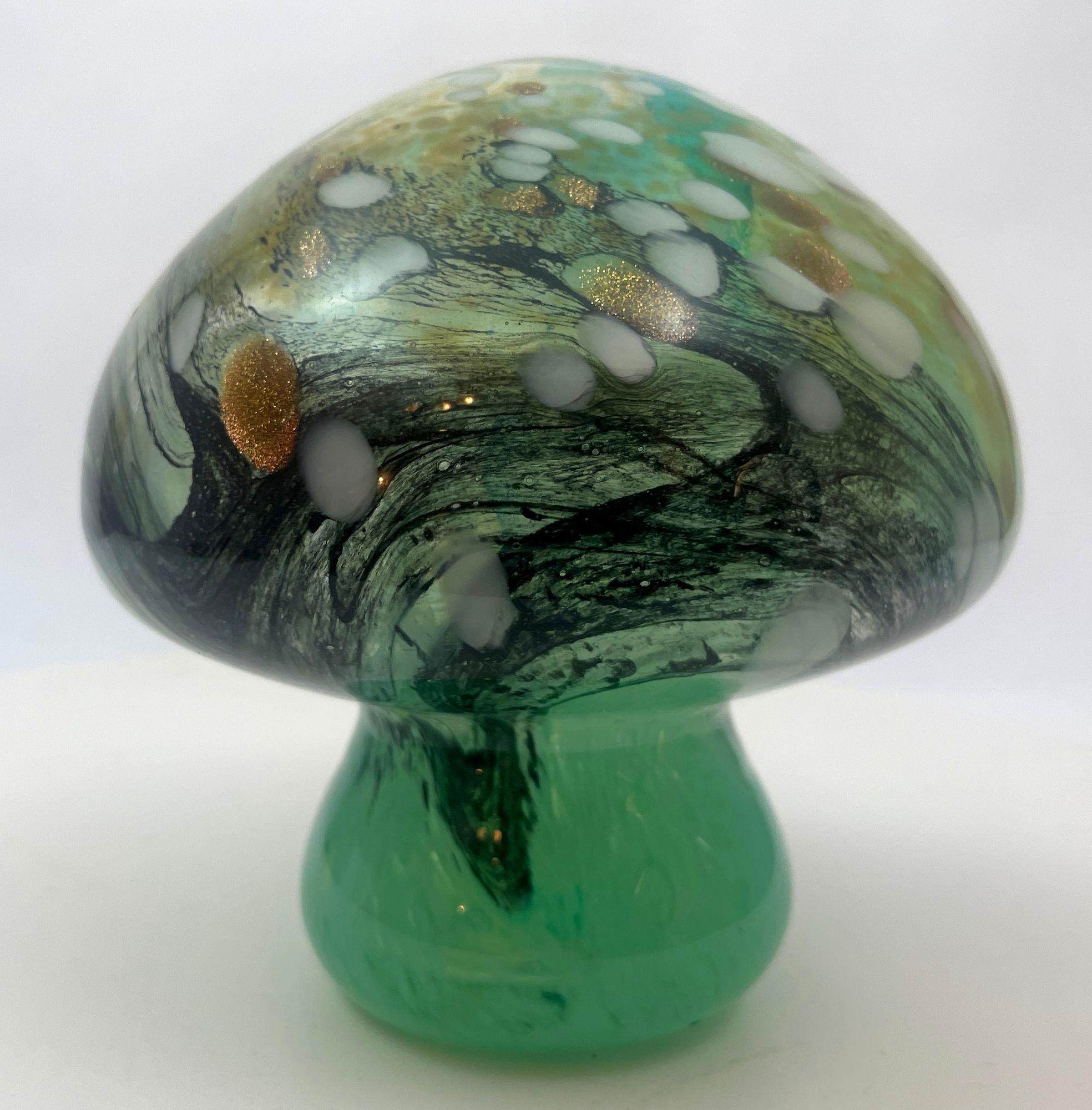 Murano Style Italian Art Glass Mushroom Toadstool Paperweight Blue Gold Green and Yellow 1980s.
Beautiful vintage Murano style hand made blue, murine Gold, with green and white spots Italian art glass mushroom toadstool paperweight.
It is made with
