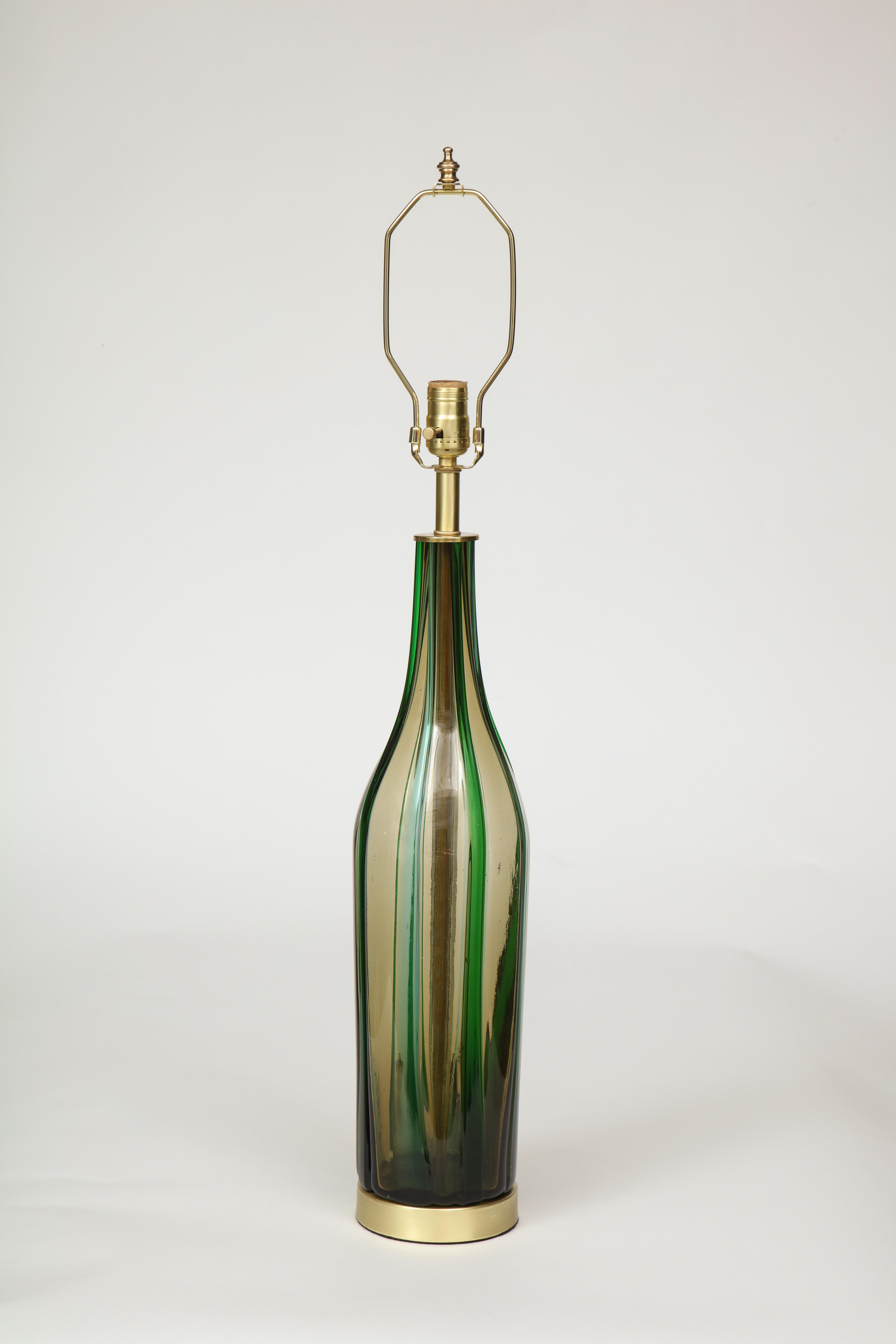 Pair of bottle form Murano glass lamps in olive green with applied vertical stripes, sitting on satin brass bases. Rewired for use in the USA, 100W max bulbs.