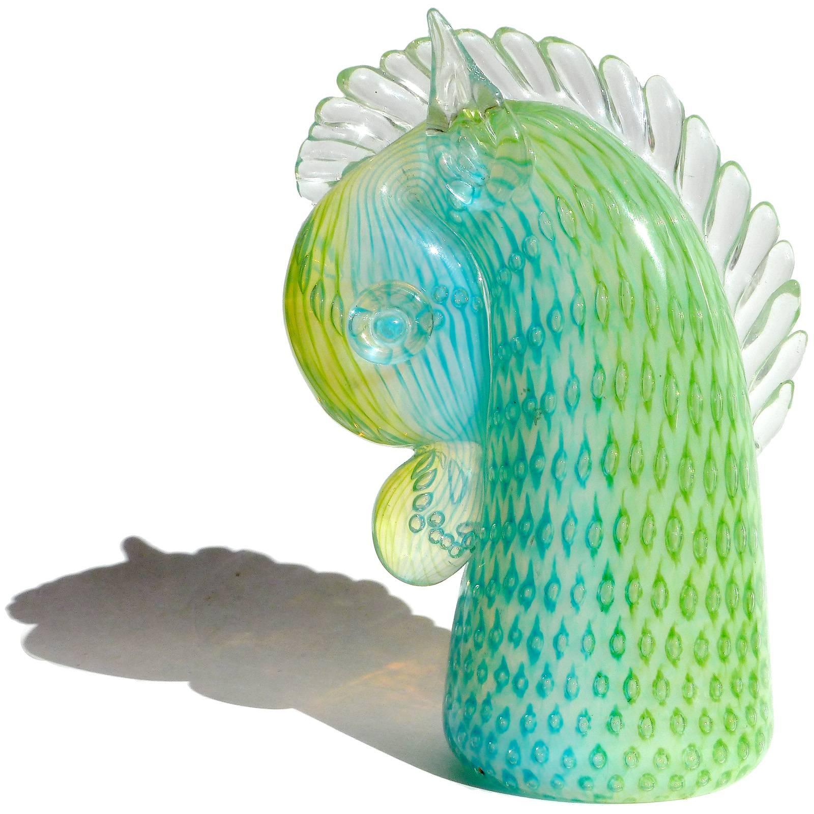 Cute vintage Murano hand blown opalescent green, blue with controlled bubbles Italian art glass horse head paperweight / sculpture. Documented to the Fratelli Toso Company, and still retains a partial 