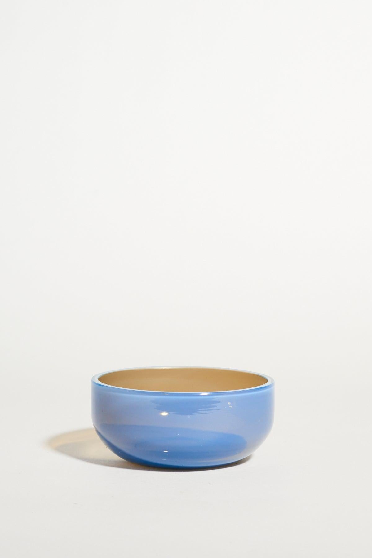 Simple classic Murano bowl in opalescent periwinkle blue glass with a pale coffee beige interior.