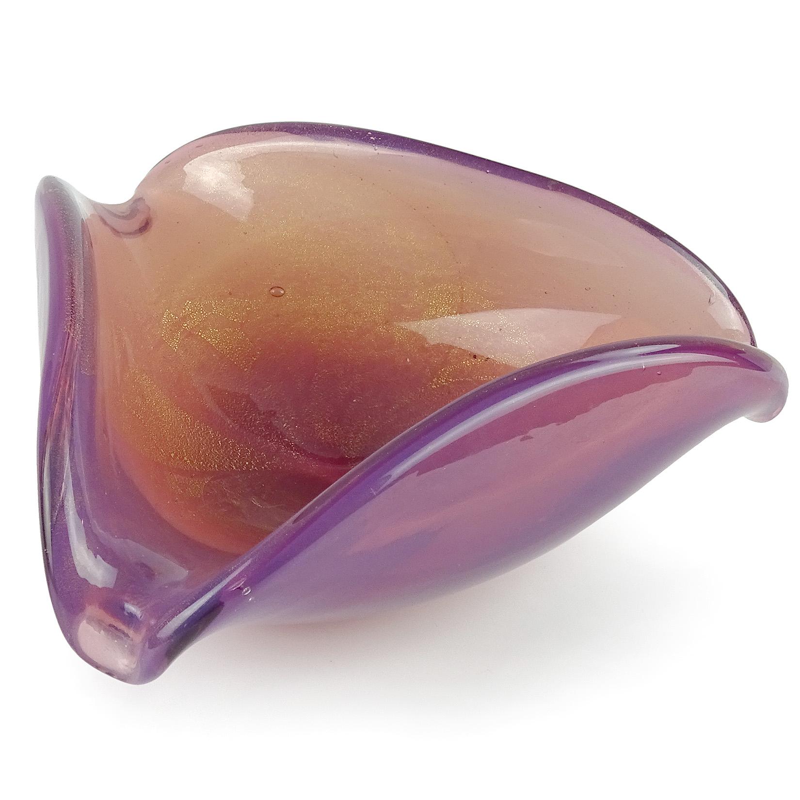 Beautiful vintage Murano hand blown opalescent purple / pink and gold flecks Italian art glass decorative bowl. The piece is covered in gold leaf inside and has a triangular shape. Can be used as a display piece on any table. Use it as a catchall,