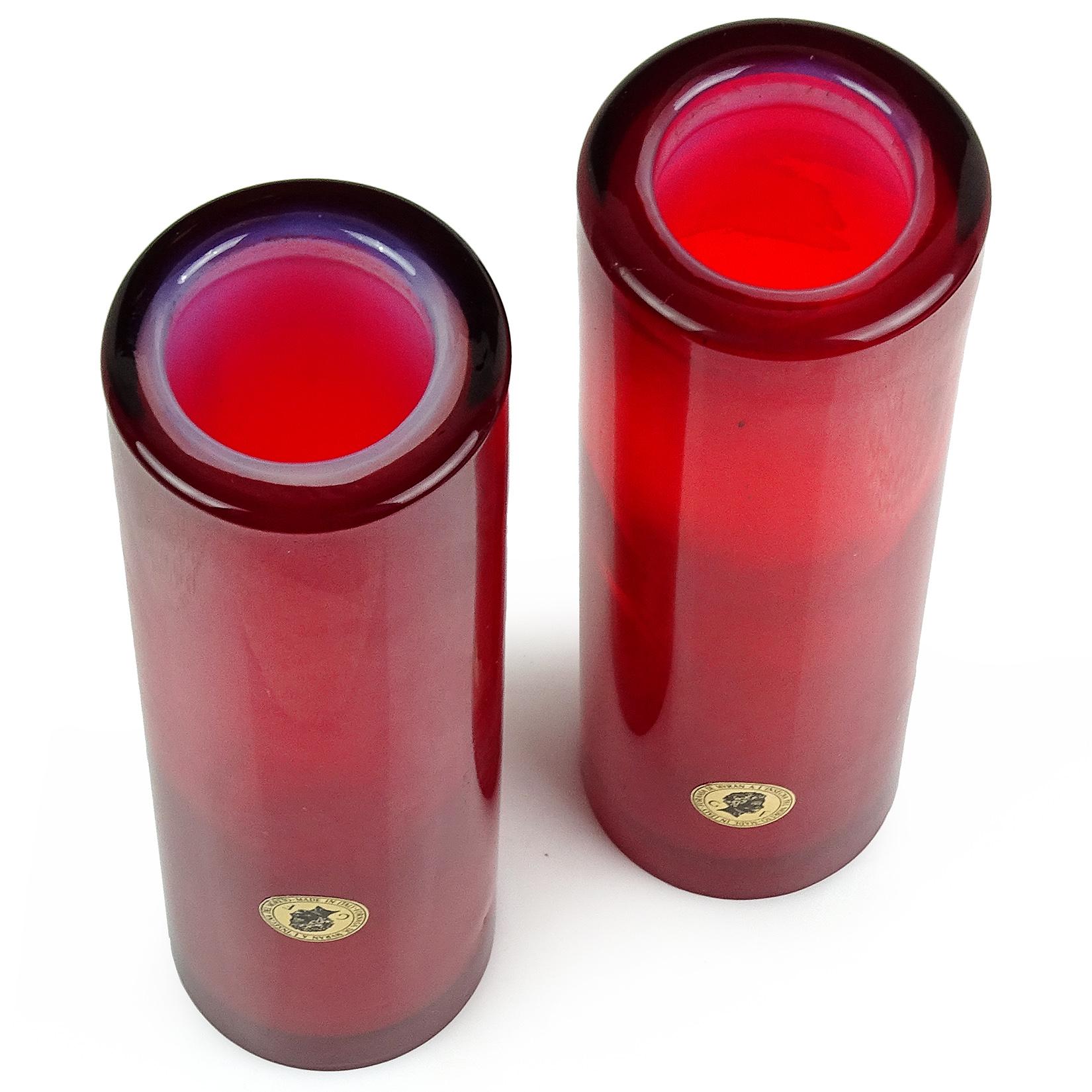 Priced per vase (2 available as shown). Beautiful vintage Murano hand blown red over opalescent white Italian art glass flower vases. Documented to the Galliano Ferro - Fornasa De Murano A L'Insegna Del Moreto Company. Original labels attached to