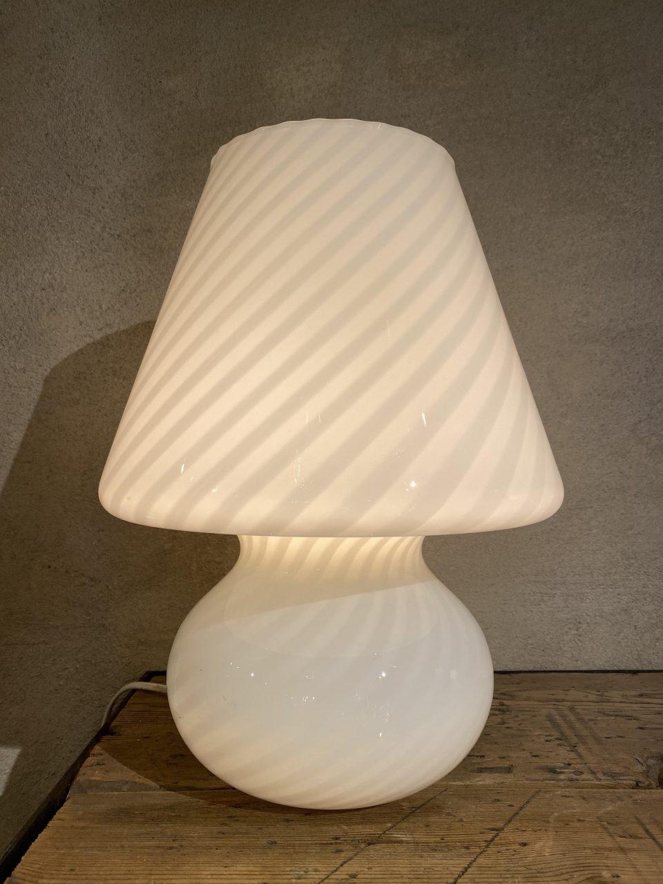 Gorgeous Murano glass table light, in an eye catching ‘mushroom’ form. Made in a wonderful milky white and with clear swirled opaque glass, which casts a stunning light when lit.

A true classic within interior design, from the 1960s-1970s.