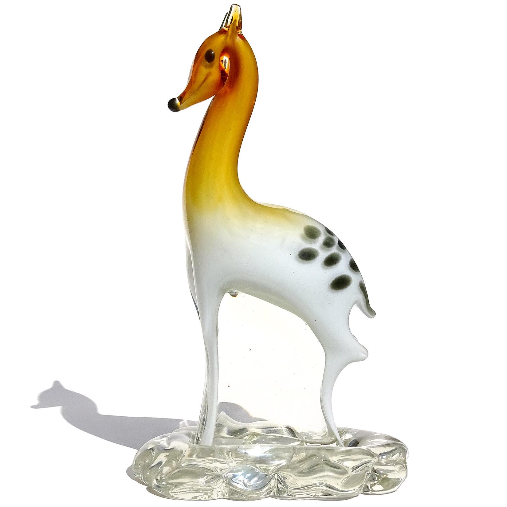 Beautiful vintage Murano hand blown orange to white Italian art glass Bambi deer fawn sculpture. Attributed to Master glass artist and designer Alfredo Barbini, for the Salviati Company. The deer has an 