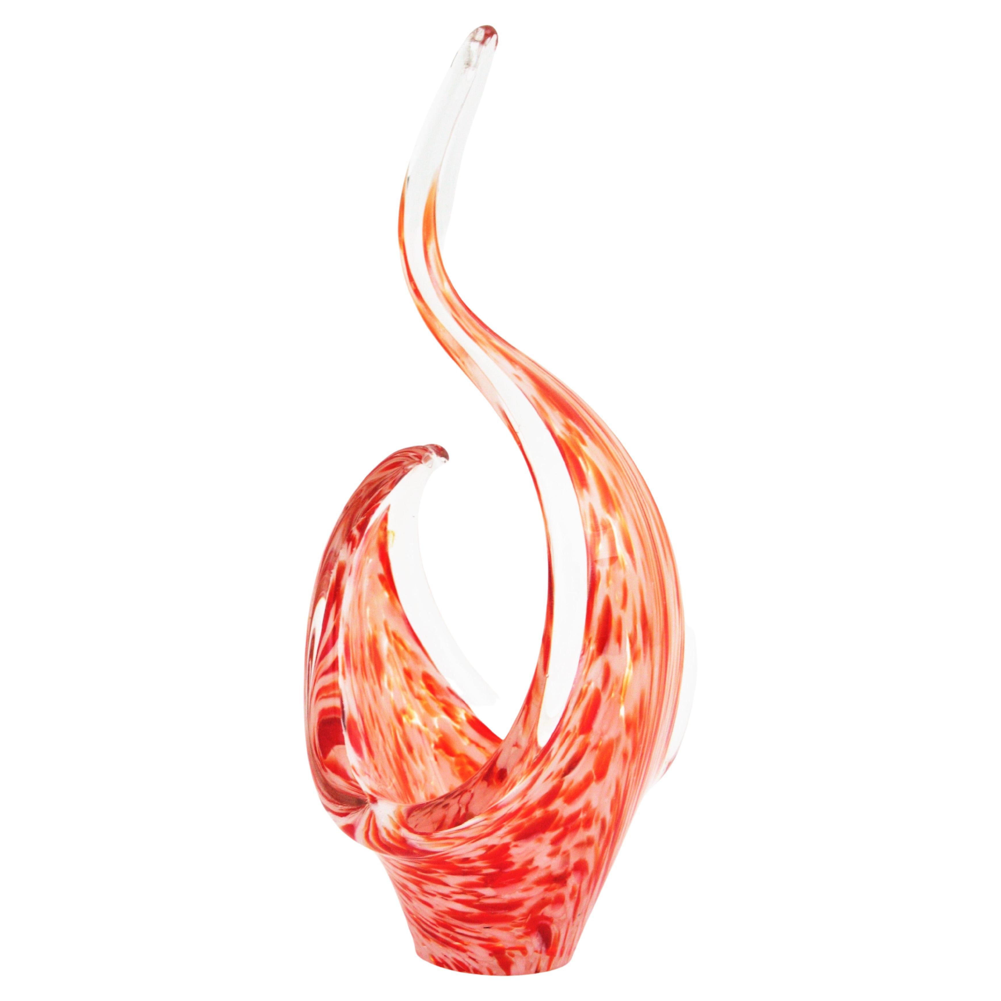 Murano Art Glass Bowl, Italy, 1960s.
Sinous Murano art Glass bowl with free form design in clear glass with spots and stripes in white and orange / red glass.
Lovely to be used as rings bowl, candy bowl or decorative bowl. Place it alone or as a