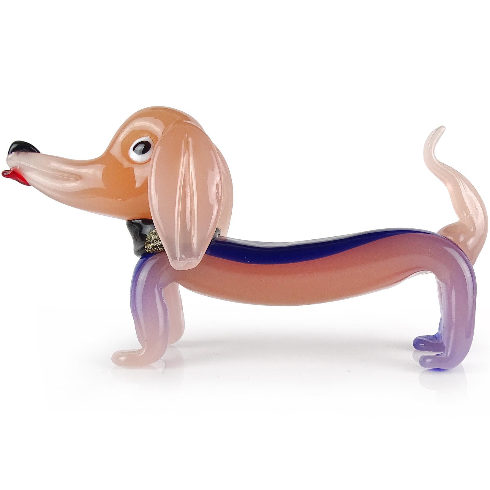 Beautiful and cute, vintage Murano hand blown opalescent peachy pink and blue Italian art glass Dachshund puppy dog sculpture. The puppy has a cartoony feel, with black collar, floppy ears, and tongue sticking out. The collar has gold leaf on it.