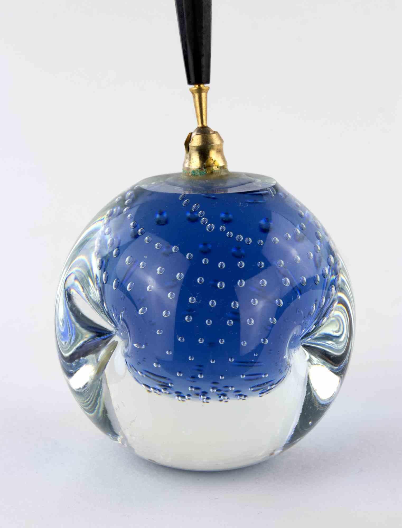 Murano Pen holder is a decorative object realized in the 1970s.

A decorative blue colored Murano glass pen holder.

An elegant object to be collect.