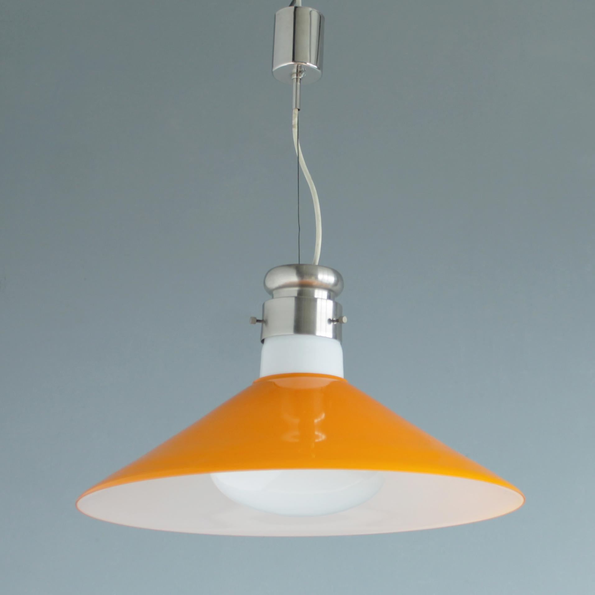 Large cased Murano glass pendant by the Italian designer Alessandro Pianon for Vistosi, Italy, 1960.
Dimensions: height of the lamp: 11.0 in. (28 cm), diameter orange glass: 19.7 inches (50 cm). From ceiling till drop: 35.0 inches (89 cm).
The