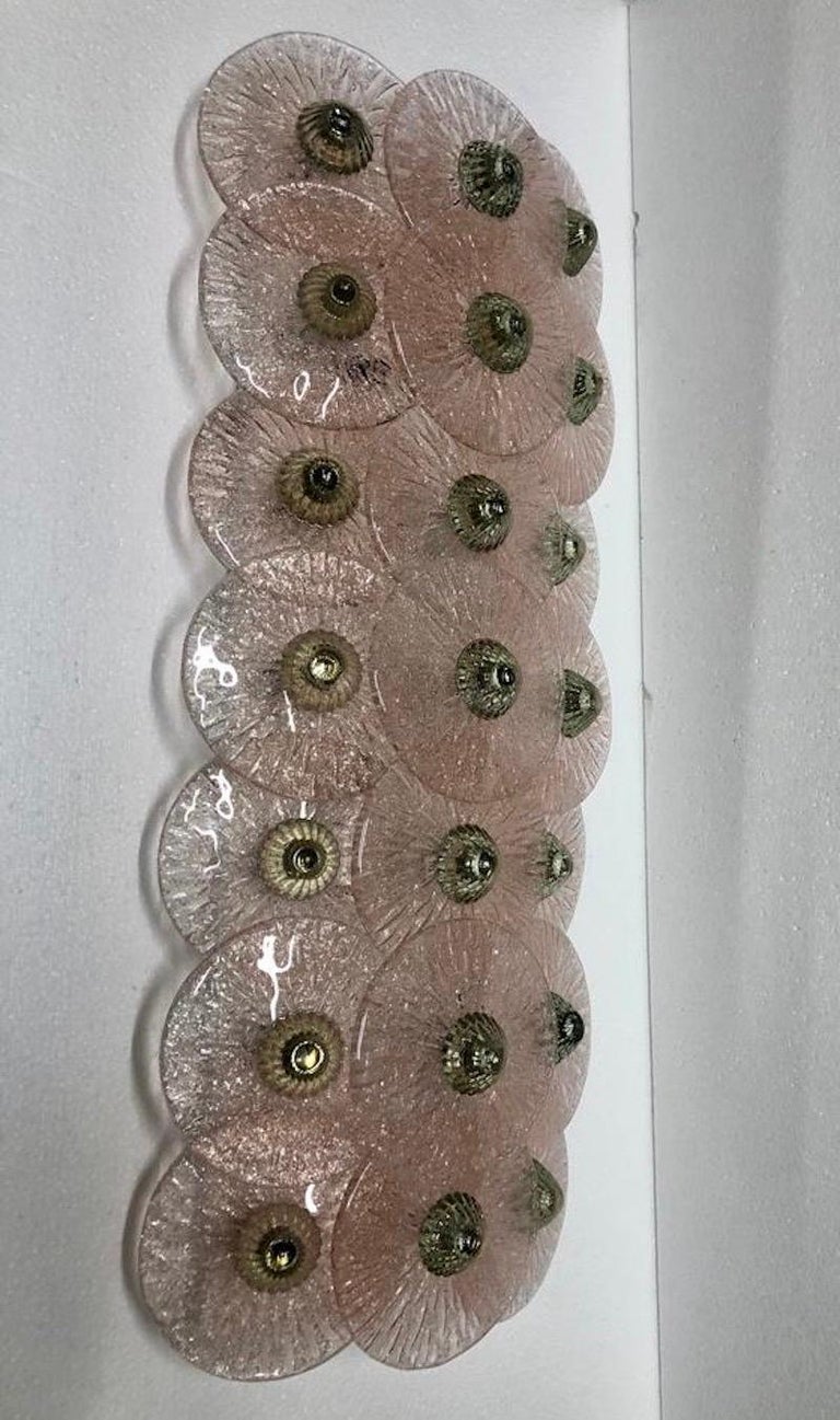 Amazing Murano piece due to its pink color with green trim. Particular and original applique from the manufacture of Murano glassworks.

The applique is composed of an underlying white metal plate, to which pale pink Murano glass discs have been