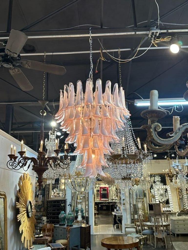 Modern Murano pink and white saddle glass waterfall chandelier. Circa 2000. The chandelier has been professionally rewired, comes with matching chain and canopy. It is ready to hang!