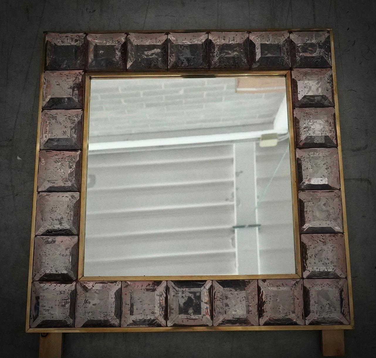 A strong pink frame reaches the eye of the beholder, leaving him enraptured. The Murano furnaces create an indisputable timeless design, simple but elegant at the same time.

The structure of the wall mirror is made of wood, where the pink Murano
