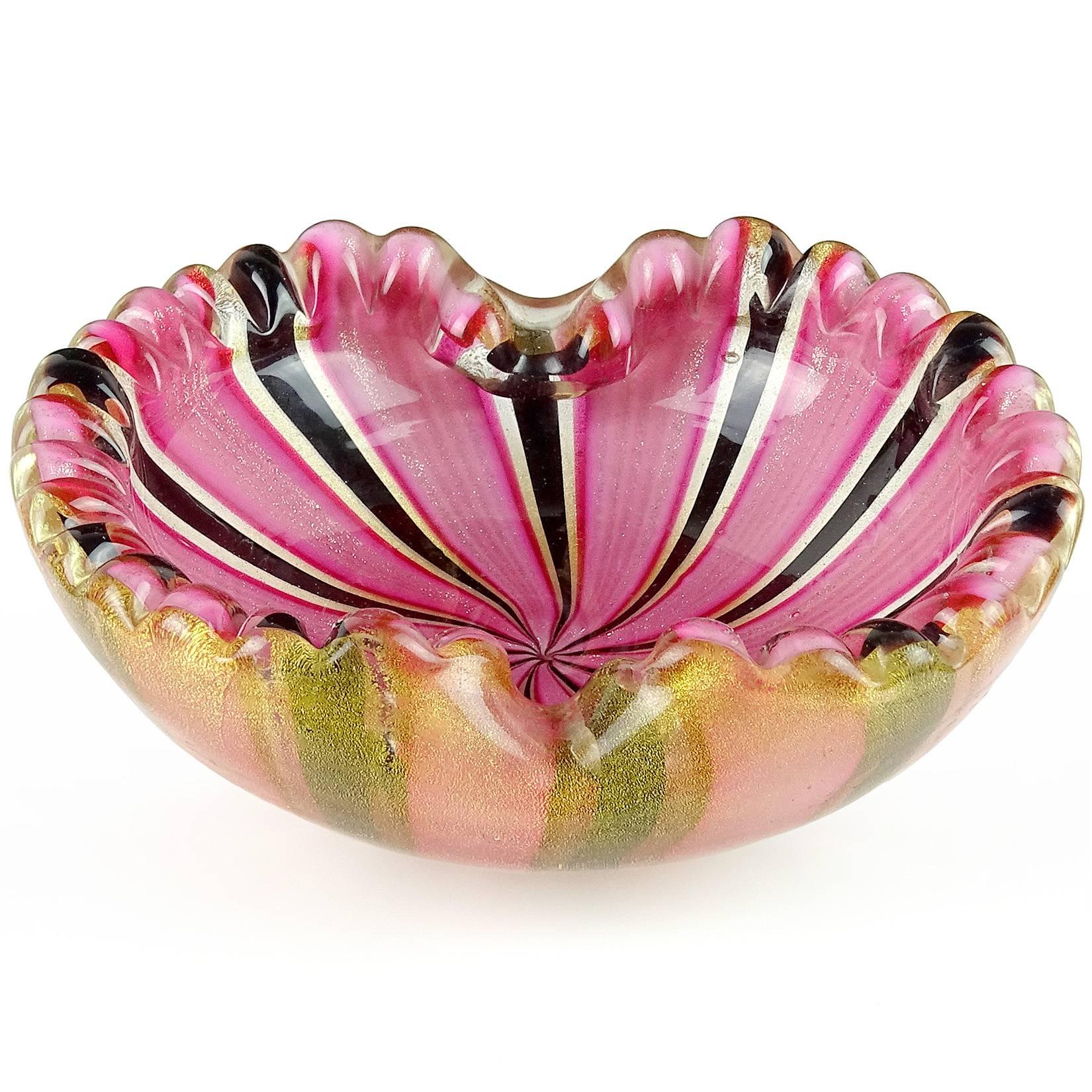 Beautiful vintage Murano hand blown pink, black, aventurine and gold flecks Italian art glass decorative bowl. Attributed to Dino Martens for Aureliano Toso. The bowl is made with 