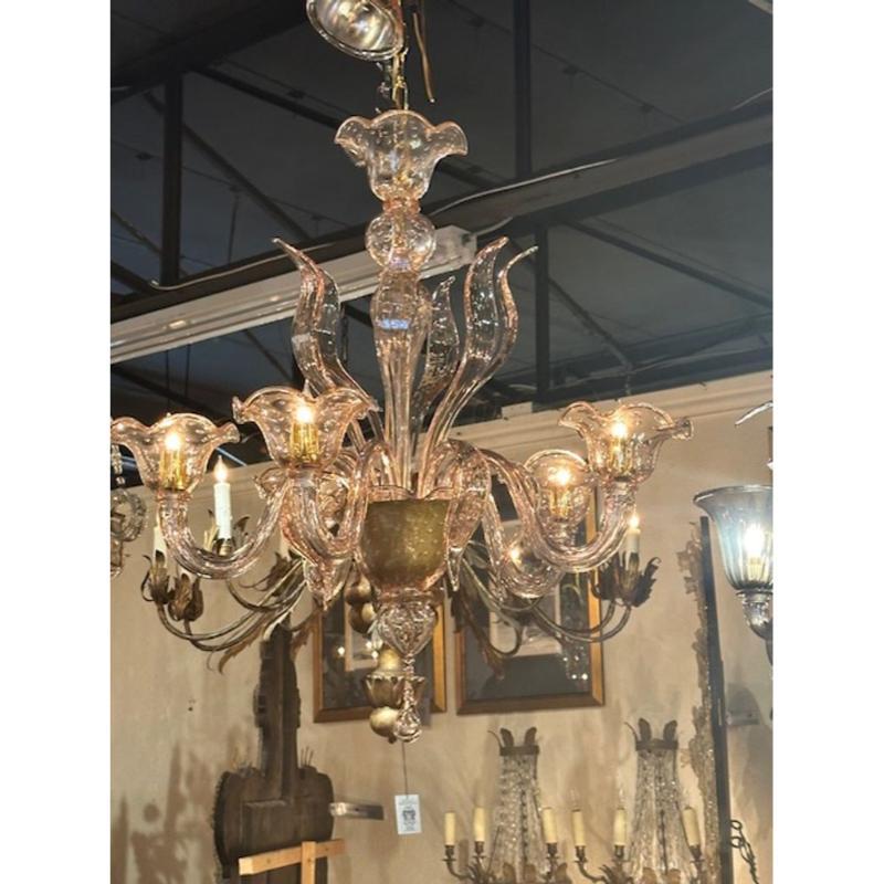 Modern Murano pink bubble glass chandelier. Circa 2000.
The chandelier has been professionally rewired, comes with matching chain and canopy. It is ready to hang!