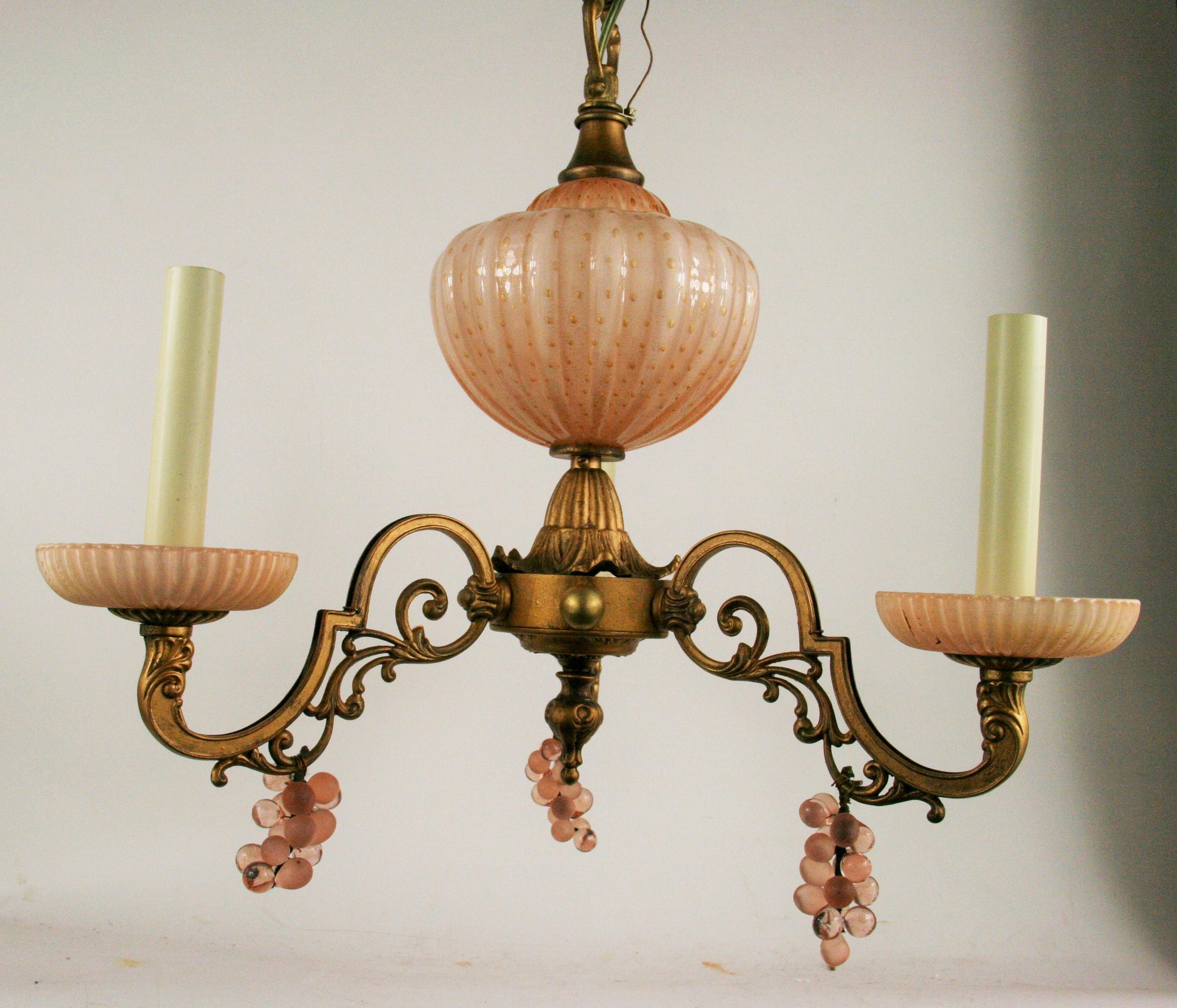 Three light Murano glass and brass chandelier.