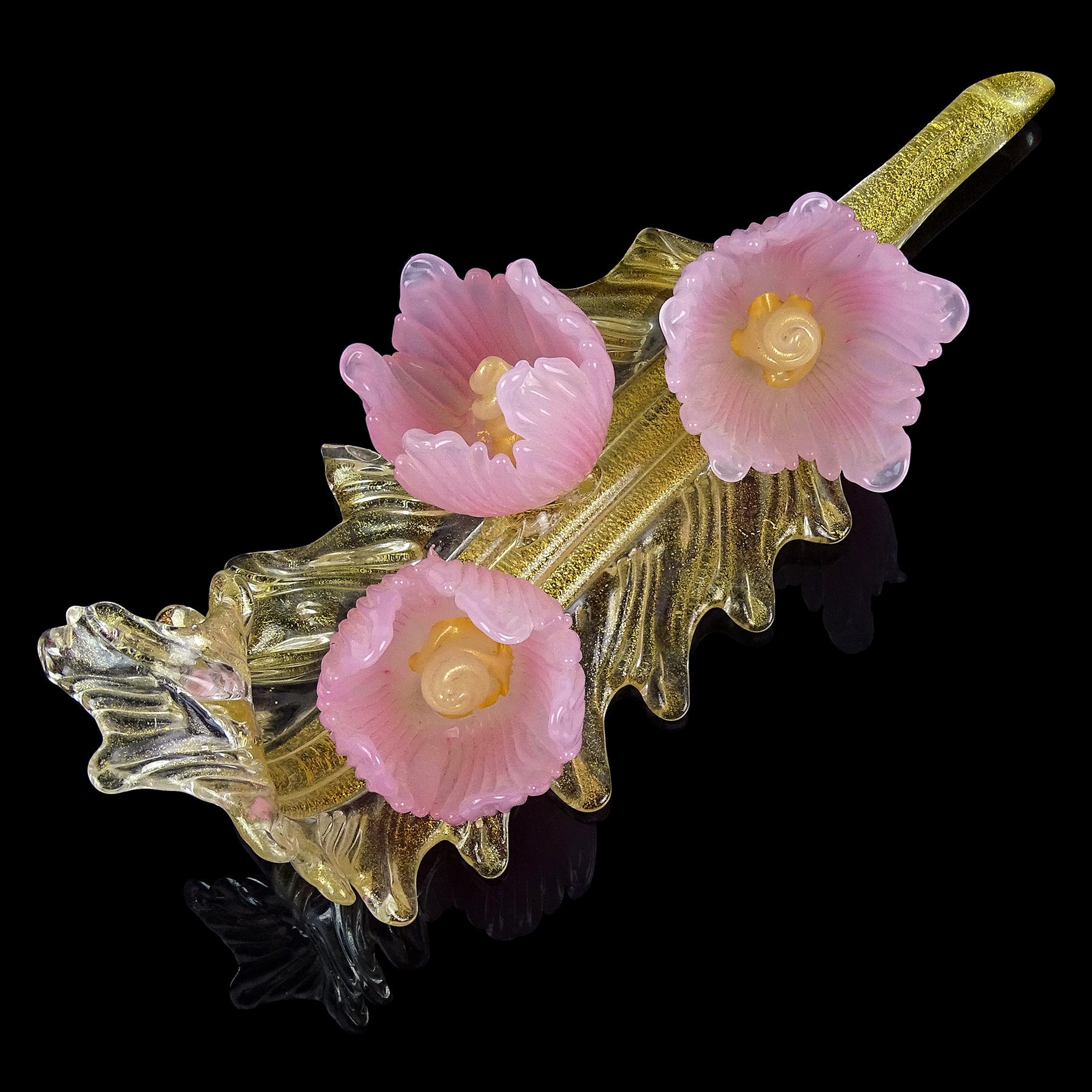 Gorgeous and large, vintage Murano hand blown opalescent pink flowers and gold flecks Italian art glass centerpiece sculpture. The piece is created in the manner of the Seguso Vetri d'Arte and Salviati companies. It has 3 beautiful opal flowers with