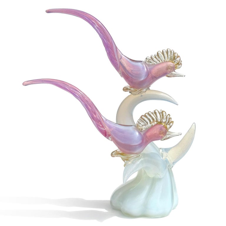 Beautiful vintage Murano hand blown opalescent pink, white and gold flecks Italian art glass birds on branch centerpiece sculpture. The pair of birds are attached to the white opal branches with clear and gold leaf glass. They look to be fancy