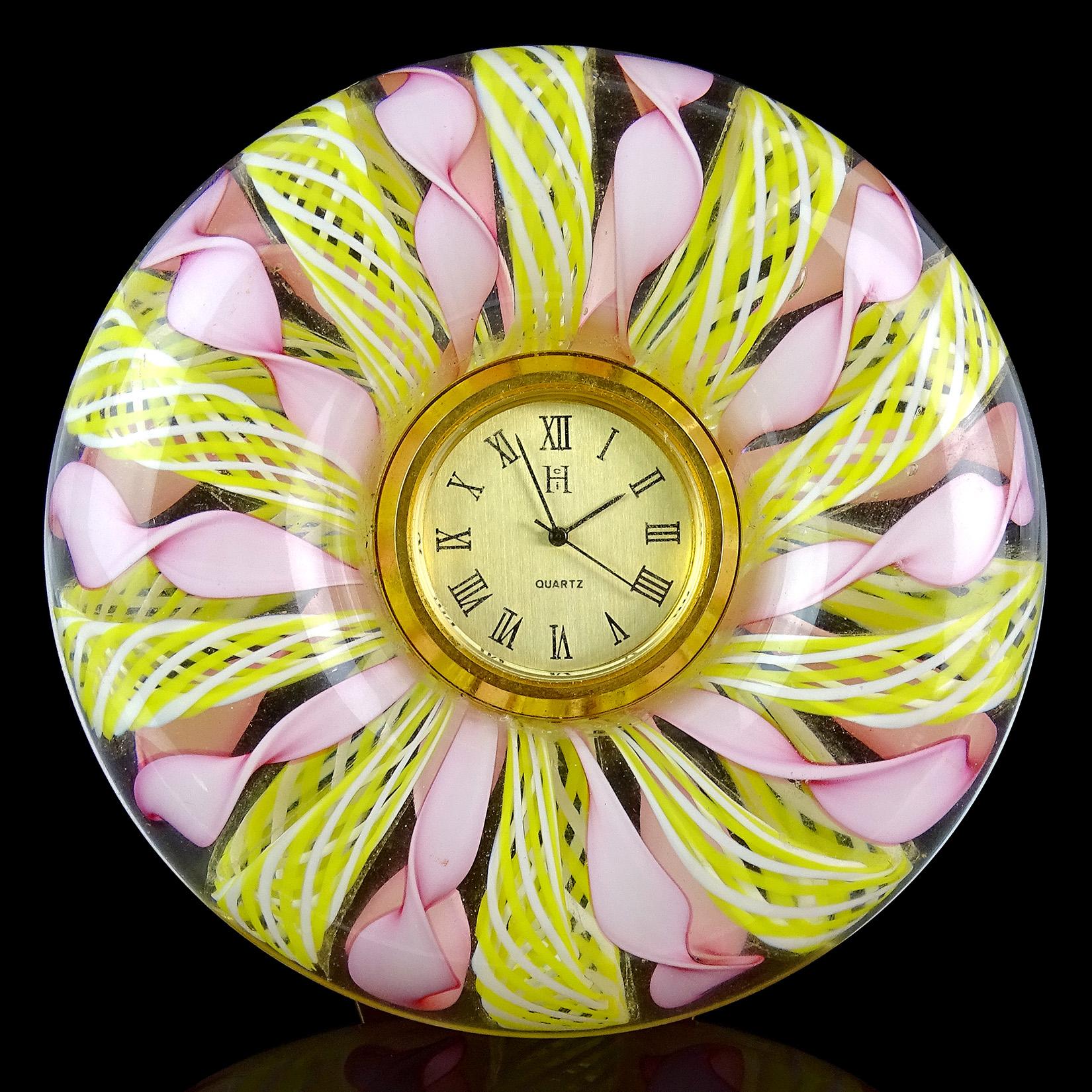 Beautiful Murano hand blown twisted pink Latticino, and yellow with white Zanfirico ribbons Italian art glass desk clock. It has a Quartz clock face, a triangle Stand on the back, and battery operated clock face (new battery, working). Great piece