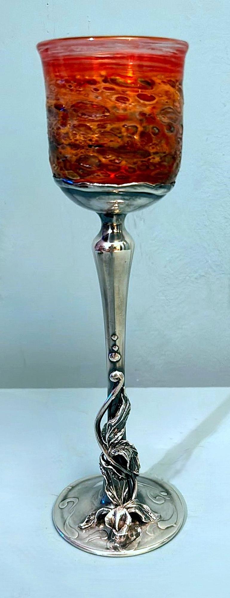 Please take a moment to read the entire description carefully, as we strive to provide you with detailed technical and historical information to ensure the authenticity of our items.
This exceptional and unique chalice features a red Murano glass