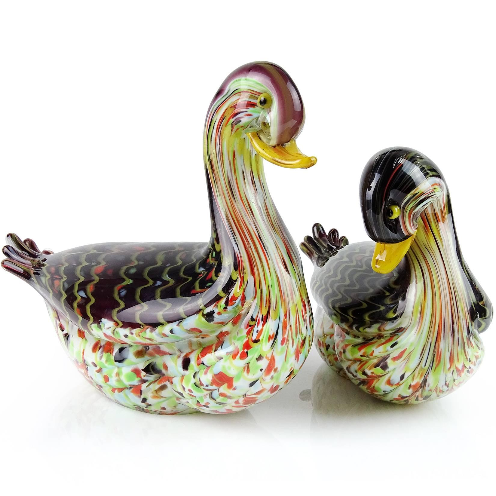 Beautiful large pair of vintage murano hand blown pulled feather Italian art glass duck sculptures. The birds are made with many different bright colors, with “Fenicio