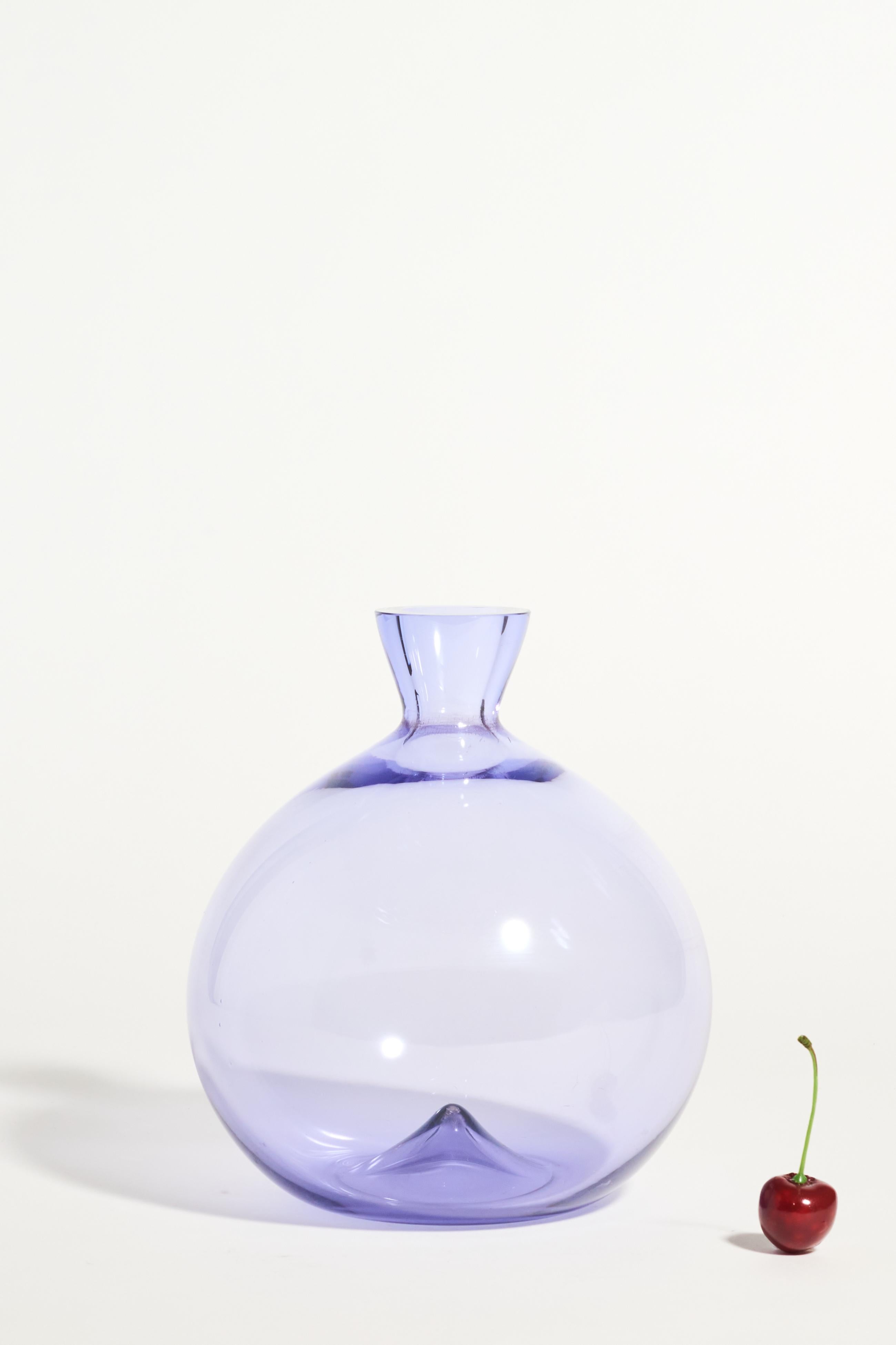 Gorgeous purple Murano glass vase from Italy with a peak and the base.
