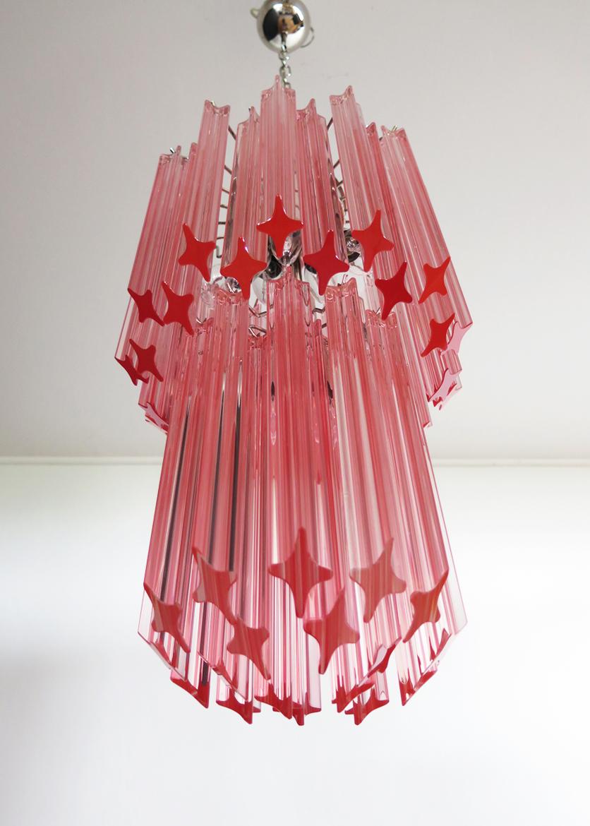 Fantastic vintage Murano chandelier made by 44 Murano crystal pink prism in a nickel metal frame.
Period: late 20th century
Dimensions: 55.10 inches height (140 cm) with chain; 27.50 inches height (70 cm) without chain; 12.6 inches diameter (32