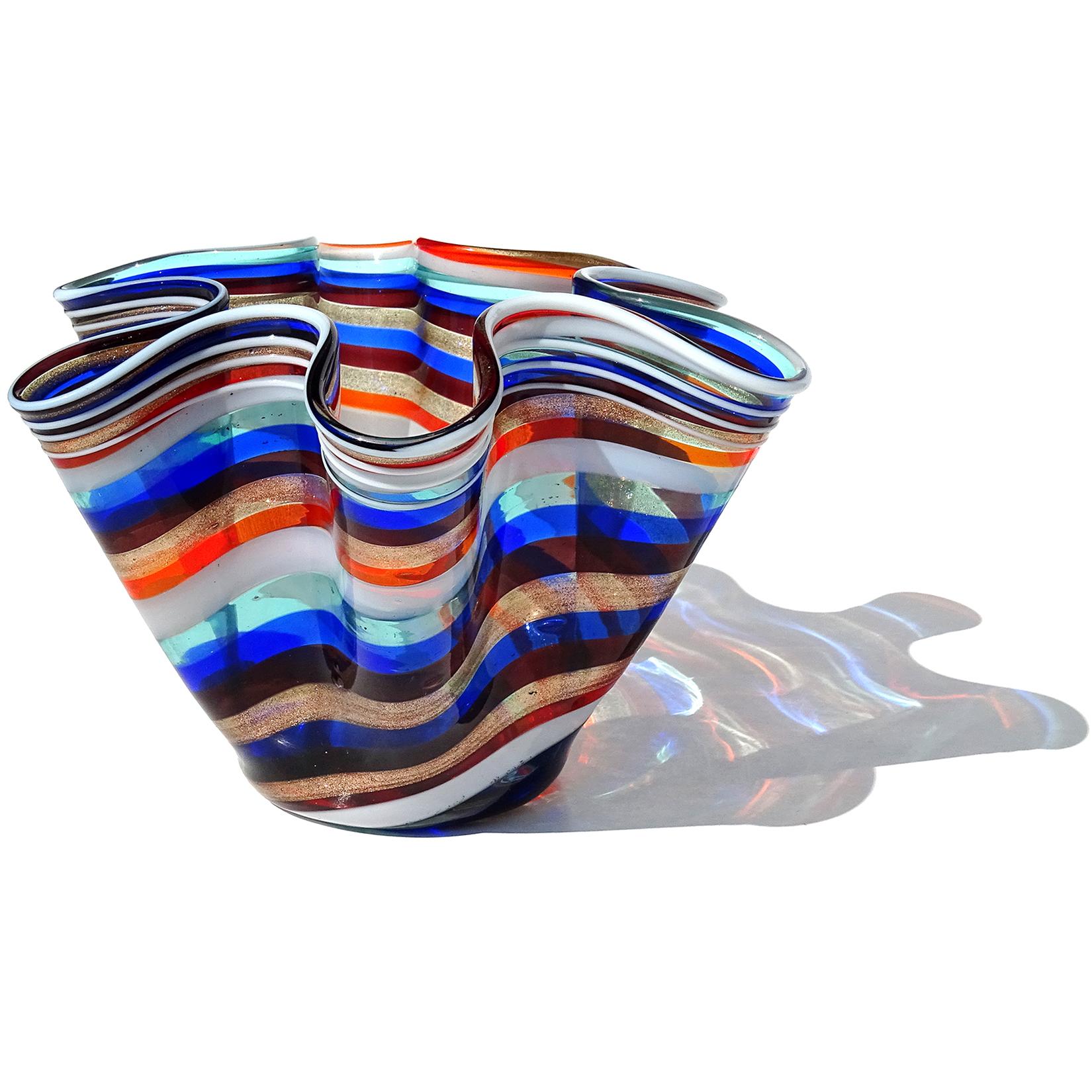 Beautiful and rare, vintage Murano hand blown rainbow or colors and aventurine flecks ribbons Italian art glass handkerchief / fazzoletto vase. Created in the manner of Venini and the Fratelli Toso company. The vase is made with swirling white,