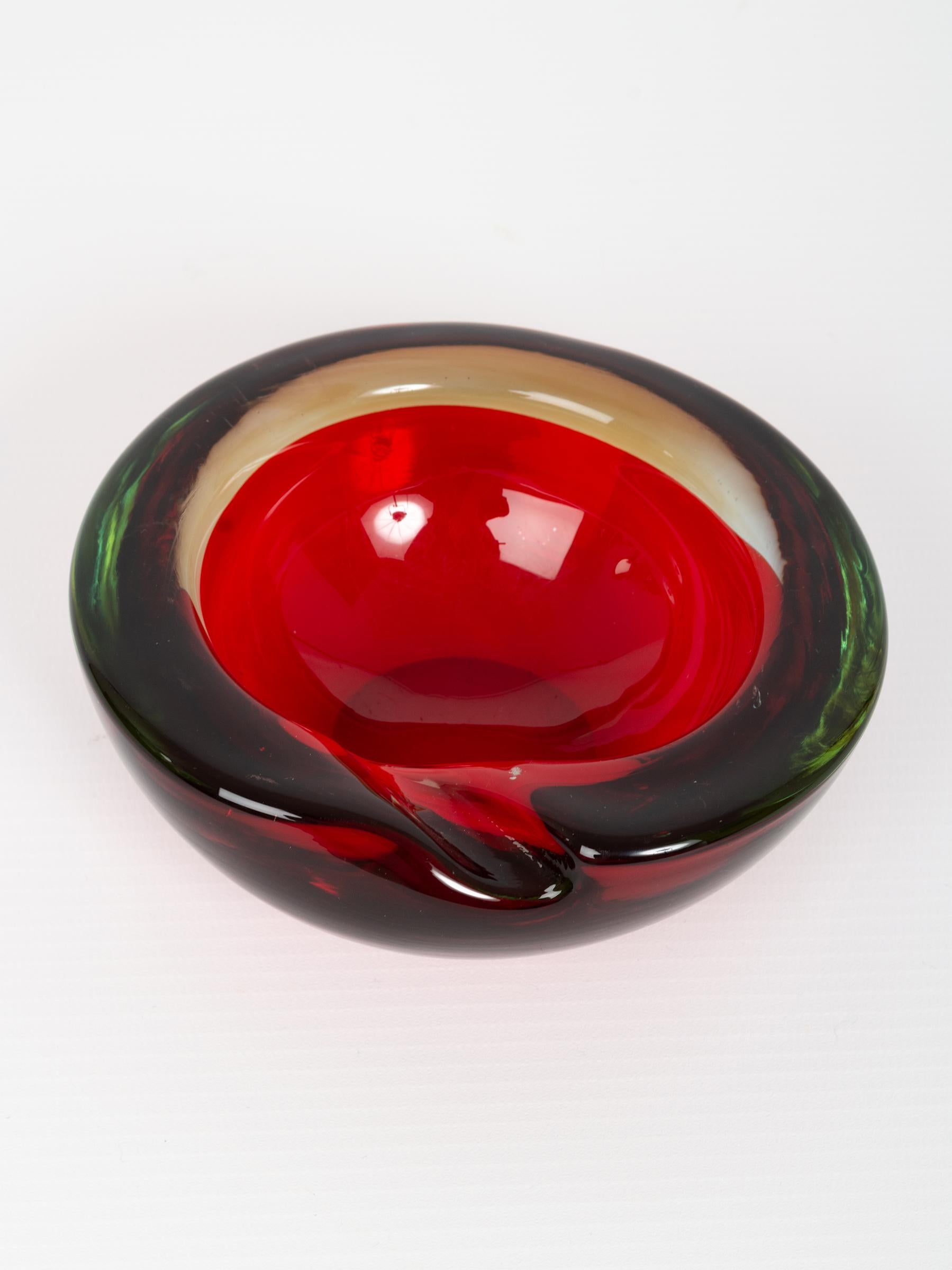 Murano red glass ashtray bowl, Italy, circa 1960.
In very good vintage condition with one small inclusion.
 
