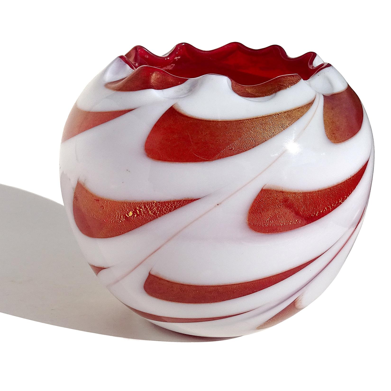 Beautiful vintage Murano hand blown red, white and gold flecks Italian art glass pulled feather rose bowl flower vase. It has heavy gold leaf on the open red sections. Created in an older Venetian style. The piece is almost a perfect ball, with