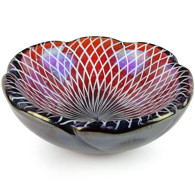 Beautiful vintage Murano hand blown red orange, white Roticello ribbons, and iridescent Italian art glass decorative bowl. Has a crimped rim, with flower shape. The piece is made with very thick glass. Can be used as a display piece on any table.
