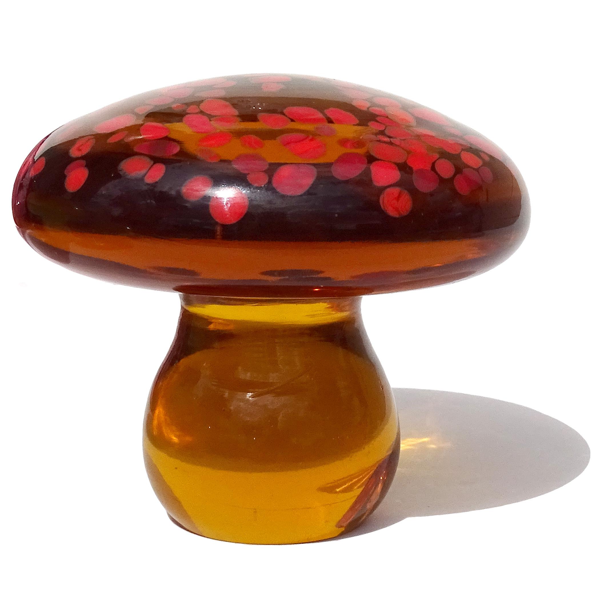 Beautiful vintage Murano hand blown honey amber with red-orange spots Italian art glass mushroom / toadstool paperweight. Created for the Fornasa De Murano A L'Insegna Del Moreto company, by designer Galliano Ferro. The piece still retains an