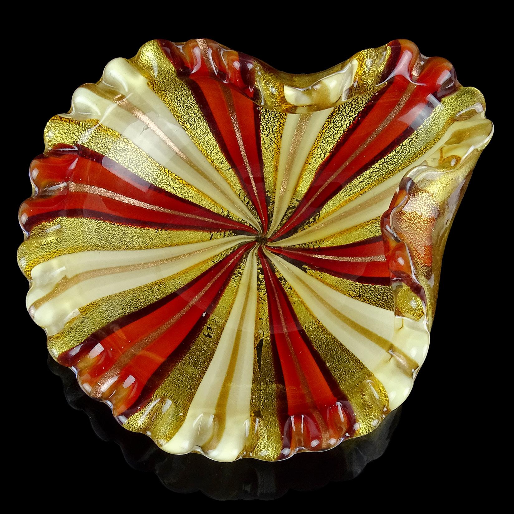 Gorgeous vintage Murano hand blown red, white, copper aventurine and gold flecks Italian art glass decorative bowl. Made with large ribbons of red and white, with copper aventurine inside. It has a scalloped rim, and decorative bends on sides.