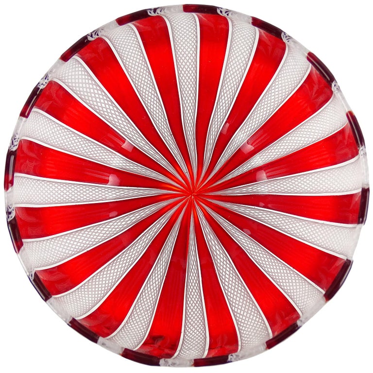 Priced per item (2 available). Beautiful vintage Murano hand blown red “A Canne” and white Zanfirico striped ribbons Italian art glass decorative bowl. Created in the manner of the Salviati and Fratelli Toso companies. Use it as a catchall, or candy